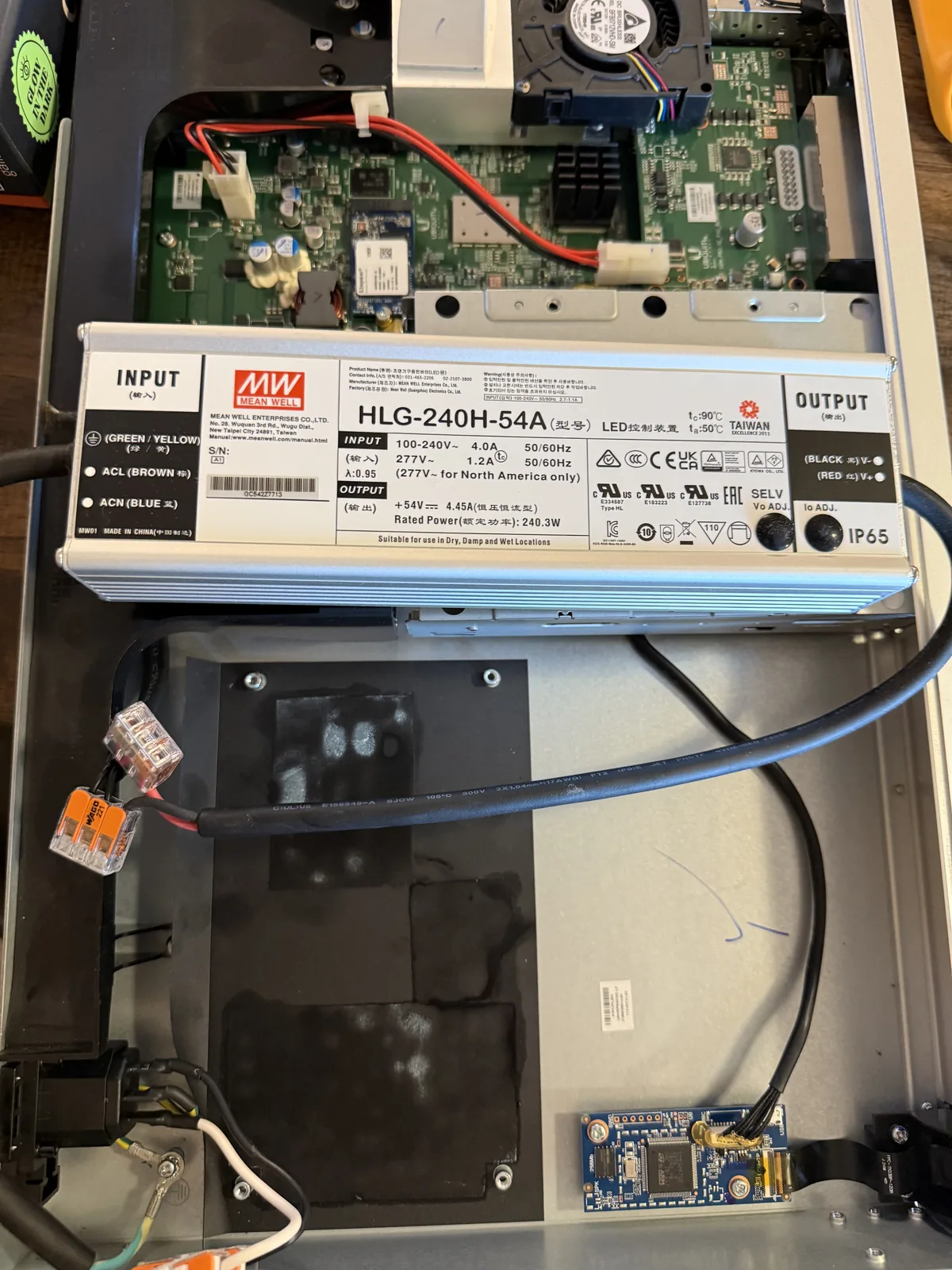 The Mean Well replacement power supply wired in and installed